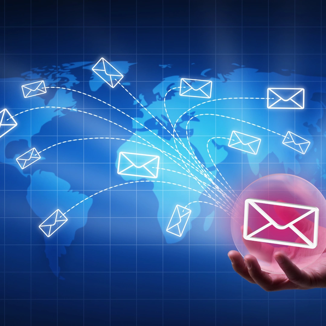 Digital envelope icons spreading across a world map.