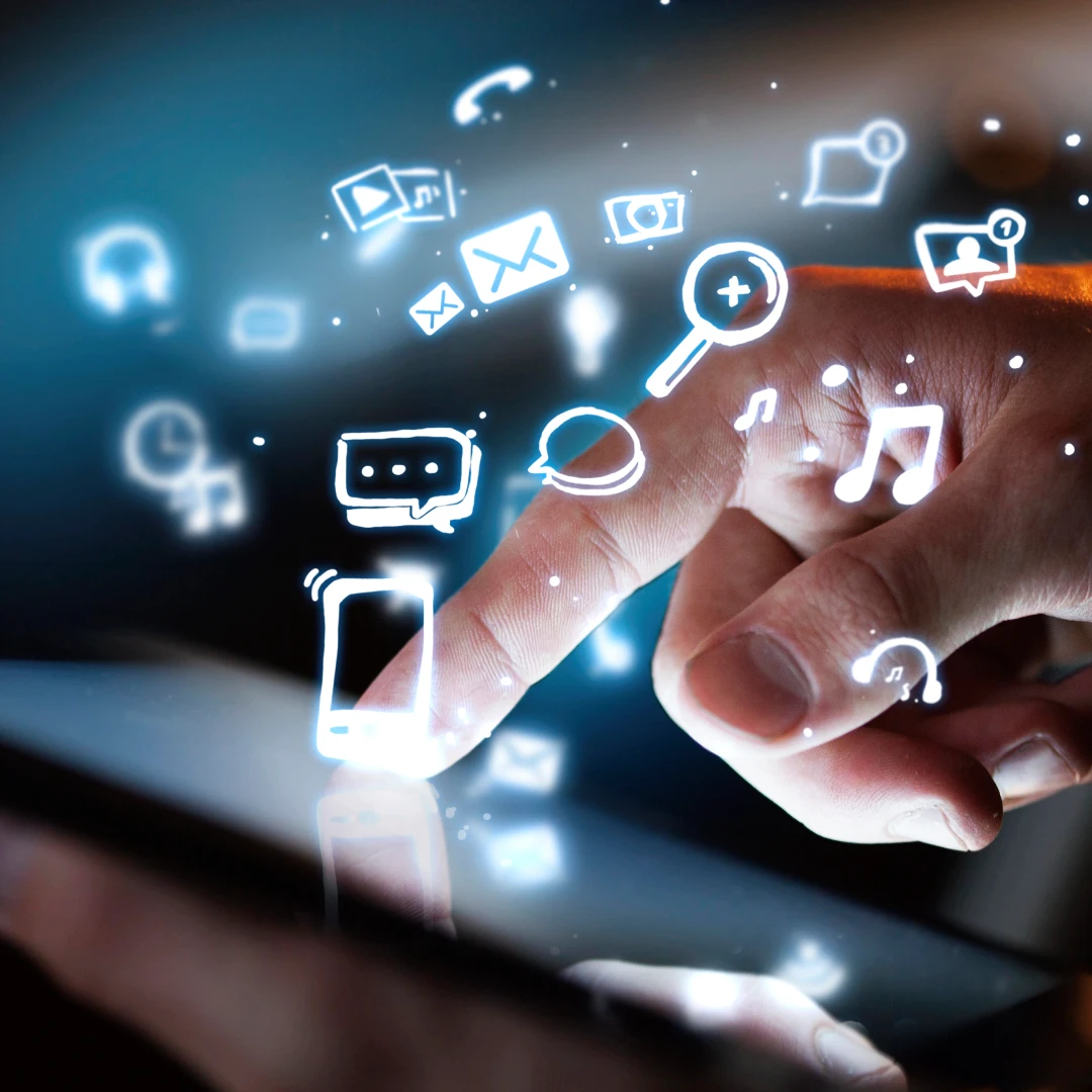 Finger touching screen with glowing digital communication icons.