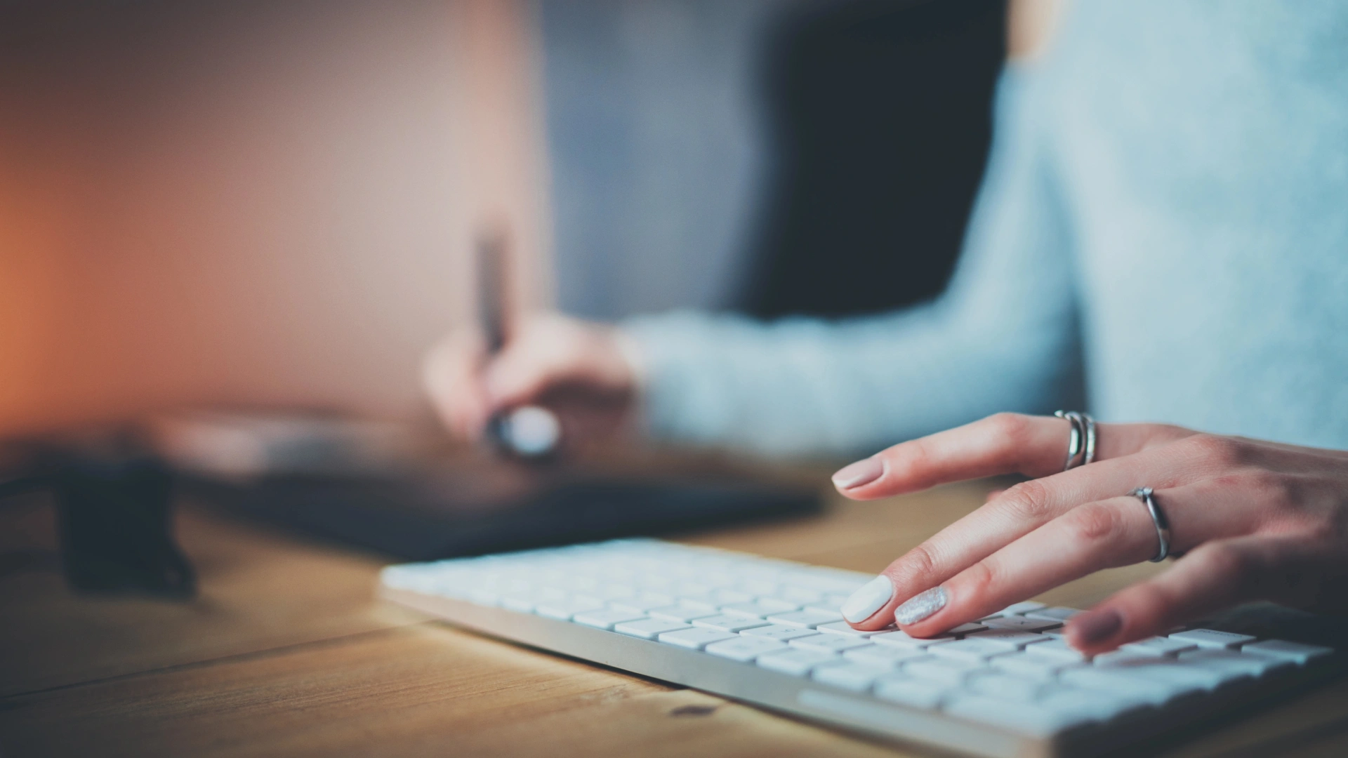 Typing on a keyboard.