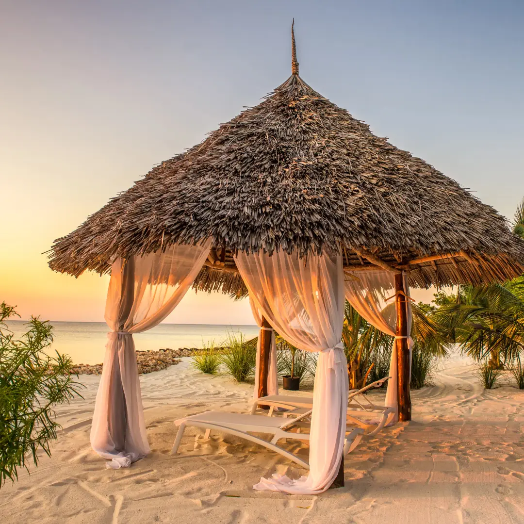 Beach cabana at sunset.